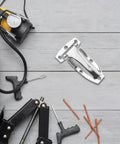 Heavy Duty Stainless Steel Trailer Door Hinges For Box Trucks Are Literally Bulletproof And Built Different To Handle The Daily Grind While Running Slick Through Any Weather Or Road Conditions Without Flinching Once on a wooden surface with tools.