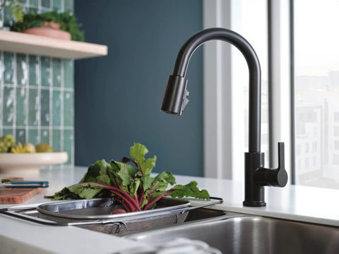 Three-Function Pull-Down Kitchen Faucet With POWERinse Technology Delivers Extra Cleaning Power, high-arc design in modern kitchen