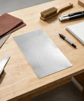 Six-Piece Bendable Aluminum Sheets For Crafting And DIY Projects on a table with tools and notebook, silver 7.87 x 3.94 inches.