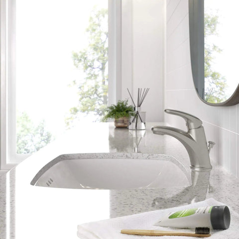 Colony Pro Single Handle Bathroom Faucet With Metal Pop Up Drain 1.2 GPM Brushed Nickel in modern bathroom setting