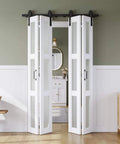 White Frosted Glass Bifold Barn Door 48x84 Inches With Hardware Kit Included Pre Drilled Holes For Easy DIY Assembly in a hallway.