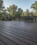 Durable As Nails Reactive Water Based Wood Stain Lays Down A Knockout Warm Brown Finish For Barn Siding Ranch Beams And Deck Projects on a patio deck.