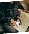 Person using Portable Compass With Mirror Ruler For Hiking And Orienteering, Lightweight Outdoor Navigation Tool For Families on map.