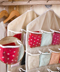 Hella Game Changing Hanging Closet Organizer Featuring Sixteen Roomy Pockets And Ultra Thick Fabric, detailed view with socks organized.