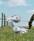 Heavy Duty Inline Wire Tensioner Kit For Electric Fences And Farm Fencing, shown installed on a wire with field and horse in background.