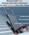 Heavy Duty Electric Stair Climbing Dolly With 660 Lb Capacity And 850 Watt Motor For Smooth Furniture Moves On Slopes And Rough Terrain Folding Design With Telescopic Handle on stairs