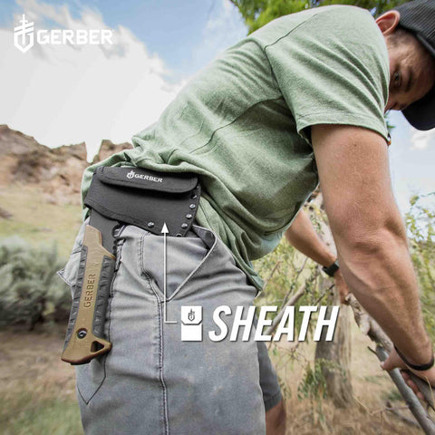 Compact Pack Hatchet With 3.5 Inch Steel Blade, Full Tang, Ergonomic Rubber Grip in sheath on person's belt during outdoor use.
