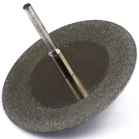 Heavy Duty Workhorse 50mm Diamond Cutting Disc For Rotary Tools Solid Carbon Steel Grinding Wheel Saw Blade Abrasive on white background.