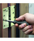 Using Compact 25 Piece Tool Kit With Precision Drivers on a door hinge for quick home repairs and handy DIY projects on the go
