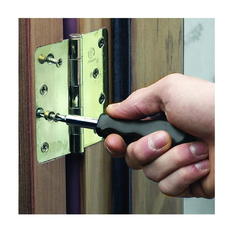 Using Compact 25 Piece Tool Kit With Precision Drivers on a door hinge for quick home repairs and handy DIY projects on the go