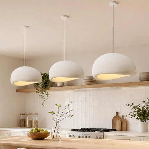 Bennyes Wabi Sabi Pendant Light 19.7 in White Modern Pendant Lights in kitchen with white cement shade and warm LED bulb.