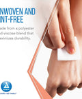 Dynarex non-woven sponge, 4x4 in, 4-ply, being applied to skin (close-up)