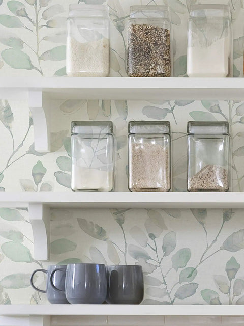 Fable Leaf Peel And Stick Wallpaper In White And Off White Floral Peelable Wall Covering behind kitchen shelves