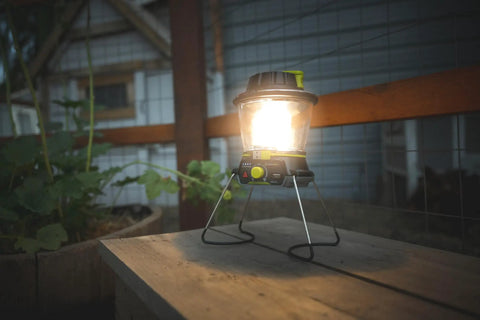 600 Lumen Multi Functional Go To Camping Lantern with USB Charging and Emergency Power on wooden table, night use