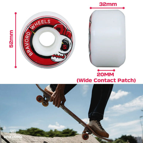 Close-up of red 52mm x 32mm skateboard wheels with wide contact patch and recessed edges for smooth glide on street and park.