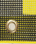 Close-up of Two Pack 18x84 Oversize Load Sign for Trucks with Bungee Cord and Hook, featuring yellow and black mesh with grommet.