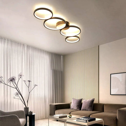 Modern Black Flush Mount LED Ceiling Light 30W 3000K Warm White 89cm Round Four Ring Fixture in a stylish living room setting