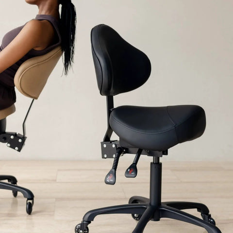 Pneumatic Swivel Saddle Chair With Wheels For Hair Stylists Dentists Hygienists And Spa Pros Ergonomic Back Support All Day Comfort Posture Boost Perfect For Clinic Salon Massage Home Or Office Durable Aluminum Frame In Black side view showing ergonomic backrest and seat.