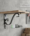 Side view of Floating Shelf Bracket For Kitchen And Living Room With Screws, Wrought Iron Wall Mount in Black on wall with tools.