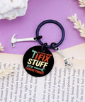 Keychain Gift For Men I Fix Stuff And I Know Things Ideal Dad Gift For Mechanic Handyman Construction Worker Engineer Husband Grandfather Birthday Or Fathers Day Gift For Any Proud Dad Who Fixes Stuff And Keeps Projects Rolling, black metal keychain with wrench and hammer charms on open book