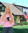 Heavy Duty 1 Inch Flag Pole Holder Bracket for Outdoor Use displayed by a person in front of a house with an American flag.