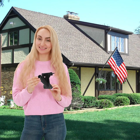 Heavy Duty 1 Inch Flag Pole Holder Bracket for Outdoor Use displayed by a person in front of a house with an American flag.