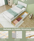 Solid Wood Twin Platform Bed With Two Smooth Rolling Storage Drawers And A Clean White Headboard, overhead view with bedding and open drawers.