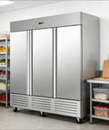 Built Tough 81 Inch Reach In Commercial Freezer Packing 72 Cubic Feet Capacity shown in a kitchen with stainless steel doors.