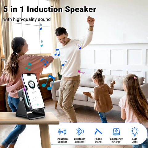 Family dancing in living room with a 5-in-1 Induction And Bluetooth 5.3 Speaker With Phone Stand and colorful lights on table.