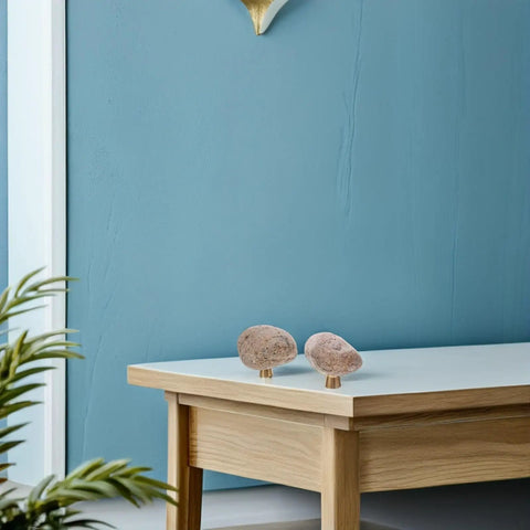 Dope Irregular Pebble Stone Cabinet Handles with Brass Base on table