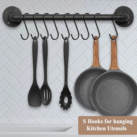 Heavy Duty 3.7 Inch S Hooks For Hanging Jeans Pans Pots Bags Towels And Plants Black Steel Fits Closet Rods Under 1 Inch Diameter Perfect Kitchen And Home Organization Space Saver installed on a kitchen rod with utensils and pans hanging.