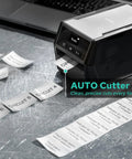 Heavy Duty Desktop Label Printer With Two Inch Print Head Mobile And Pc Control Rugged Battery on steel surface with printed circuit labels.
