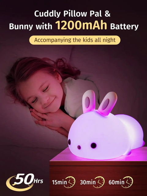 Lit Cute Bunny Night Light For Kids With 16 Colors Tap Control Dimmable Lamp beside sleeping child, gentle pink glow
