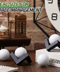 Wooden Golf Ball Display Stand 1.97 Inch Black Display Case with golf balls on desk, showcasing walnut wood finish in office setting.
