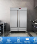 54 Inch Wide Two Door Commercial Freezer Featuring 49 Cubic Feet Of Sleek Stainless Steel Build And Automated Digital Thermostat Control in a kitchen setting.