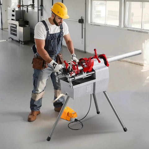 Worker using Three In One Do It All Electric Pipe Threader Machine, 750W Power, 28 RPM, on metal pipe in workshop