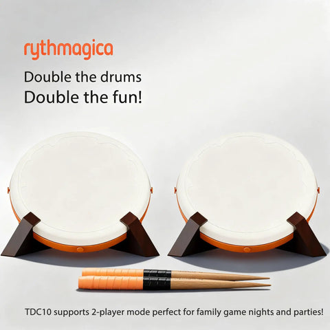Two Taiko Drum Controller Tatacon units for Switch PS4 Xbox Series X S PC iPad and Wii with adapter and sticks on stand.
