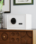 White biometric safe with fingerprint lock and touchscreen keypad on wooden cabinet, suitable for home or office use.