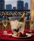 Four Liter Plastic Champagne Ice Bucket Chiller With Thick Clear Body And Two Easy Grip Handles, Wave Design Wine Cooler on table.