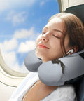 Woman using Snow Owl Travel Pillow Comfy Ergonomic U Shaped Neck Support With Memory Foam For Planes Trains Cars And All Day Trips Sleep Well On The Go Portable Head Rest on airplane