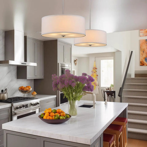 Three Light Drum Pendant Chandelier With White Fabric Shade Brushed Nickel Finish Tempered Glass Diffuser above kitchen island