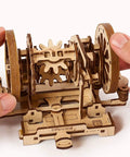 Build A Legit Working Vehicle Differential System With This Hands On Wooden Model Kit showcasing detailed gears in a wooden assembly.