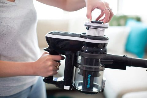 Person replacing SF65 Replacement HEPA Filter For Cordless Stick And Handheld Vacuums, S65 Models, Simplicity Vacuum