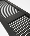 Close-up of Lifetime Vinyl Open Louver Shutters With Cathedral Top Center Mullion, 14-1/2W x 36H, black woodgrain texture.