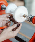 Woodworking Lathe Buffing System Two Step 4 Inch Wheel Buffing Mandrel with MT2 Morse Taper Mounts in use on wood piece