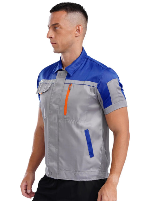 Mens Short Sleeve Mechanic Work Jacket With Reflective Safety Stripes And Heavy Duty Zipper Durable Contrast Utility Shirt Built Different And Kick Ass For The Daily Hustle on model, showing side profile in grey and blue.