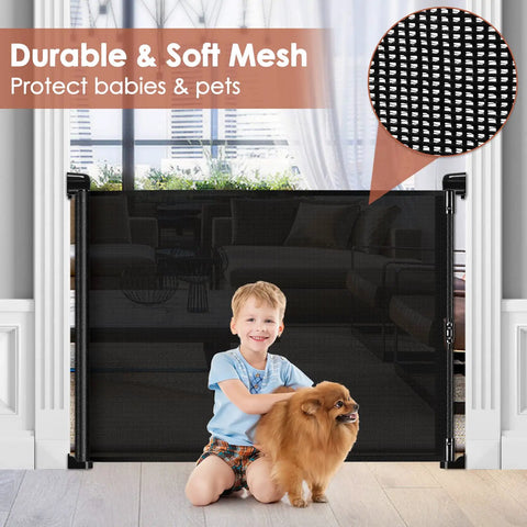 Child and dog sitting by an installed Adjustable Mesh Baby Gate 0 To 60 Inches Wide With Safety Lock Roll Up To Save Space Portable Folding Mesh Dog Gate