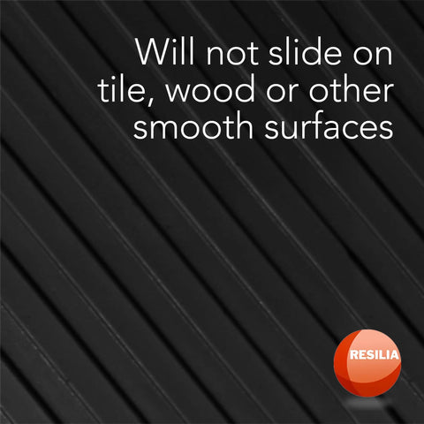 Embossed Wide Rib Waterproof Vinyl Floor Runner Heavy Duty Protector Mat For Indoor Outdoor Use 27 Inch By 6 Foot With Anti Slip Backing To Guard Hardwood Floors Tile Laminate Garage Entryway Kitchen, close-up of black ribbed surface with text overlay "Will not slide on tile, wood or other smooth surfaces."