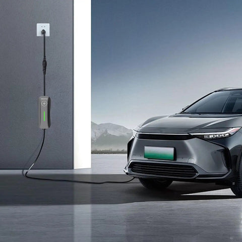 No Sweat NEMA 5 15P To 6 20R EV Charging Adapter 12 Inch UL Listed Cord connecting to an electric vehicle in a garage.