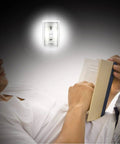 Person reading with Bright 200 Lumen Cordless COB LED Night Light With Magnetic Mounts And No Wires Needed Battery Operated Easy Install